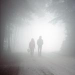 Two People Walking On Foggy Road, Seymour Mountain, North Vancouver BC