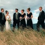 Bridal Party At Top Of Grassy Hill.