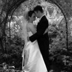 Bride & Groom Under Arbor